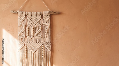 Handmade macrame wall hanging with number 2027 woven in cotton rope