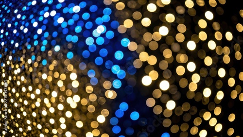 ethereal bokeh banner of blue gold and black glitter lights for premium advertising background copy space