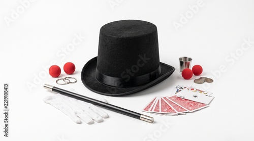 Obraz na plátně Magician's essential prop set with top hat  wand  cards and cups