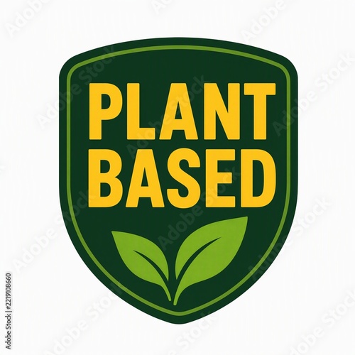Plant based green shield label with yellow text and two green leaves