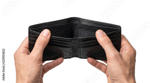 Male hands holding open empty black leather wallet to represent financial crisis and poverty concepts.