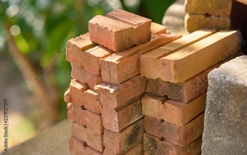 Stack of Traditional Red Clay Bricks Outdoors