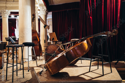 Double bass resting on a stage before a concert