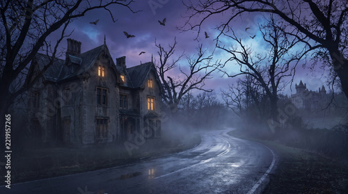 Haunted mansion stands ominously beneath a twilight sky filled with glowing bats and bare trees.