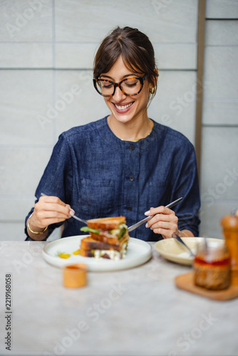 Enjoying a Meal at a Cafe During Lunch Time