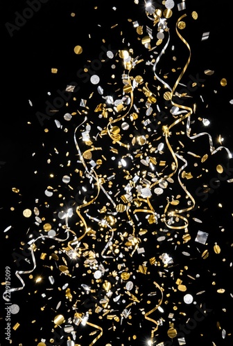 Celebration confetti raining down joyfully at a festive party