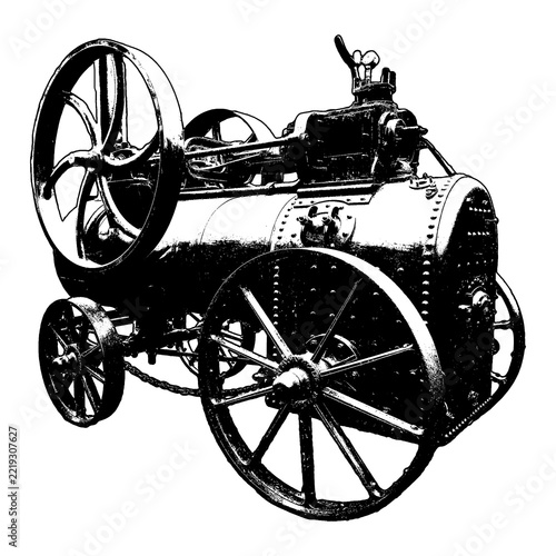 Vintage black steam engine machine on wheels