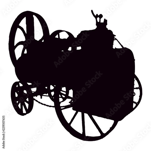 Vintage black steam engine machine on wheels