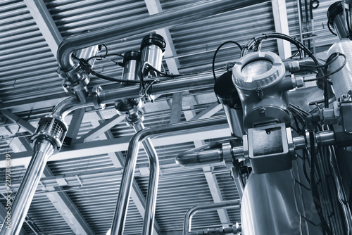 Machine for industrial pharmaceutical production of medicines, industrial pharmaceutical production concept background, tech industrial technology background