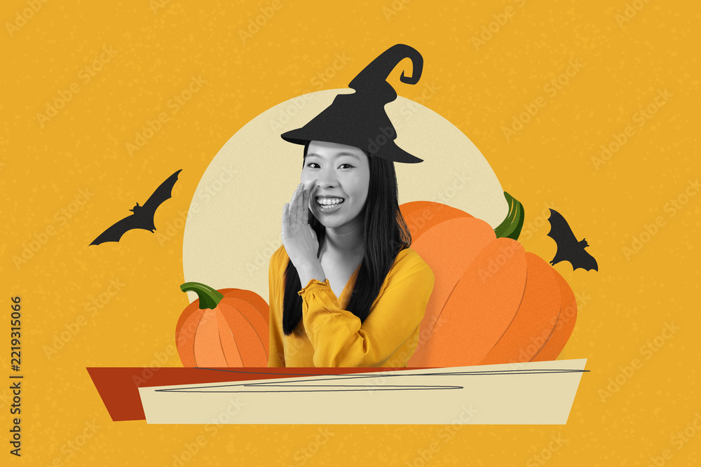 Fototapeta premium Smiling Asian Woman In Her 20s Wearing Witch Hat And Whispering With Hands On Mouth, Surrounded By Pumpkins At Home, Celebrating Halloween Festivities And Joyous Autumn Season.