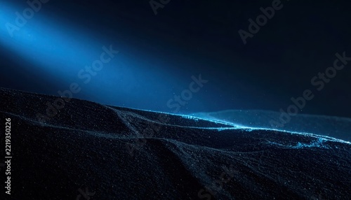 Abstract poster header cover wallpaper banner backdrop design featuring a glowing blue light blur shape on dark grain texture background with a noisy effect for modern creative digital projects