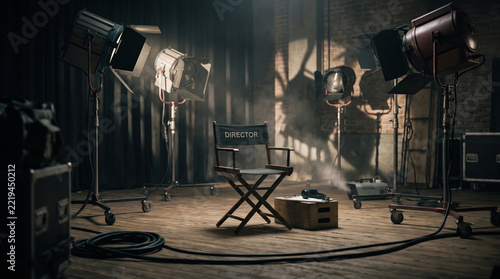 Director chair stage light film studio interior dramatic lighting equipment cable wood floor