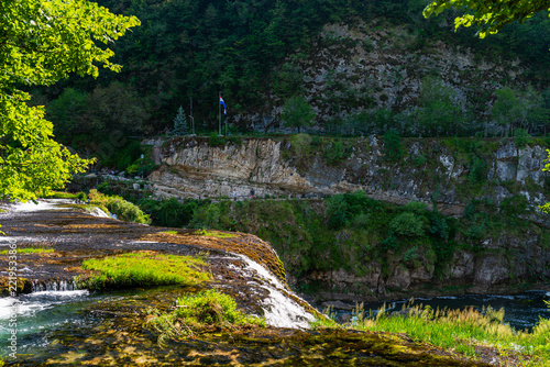 Strbacki Buk waterfall cascading over travertine ledge, Una National Park, Bosnia