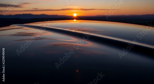 Stunning Sunset Reflection on Car Hood.
