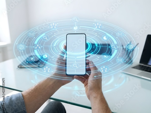 A person holding a smartphone displaying a futuristic digital marketing holographic interface for modern business data analytics and strategy
