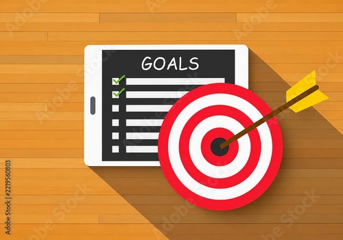 Goal setting checklist with target arrow on wooden background