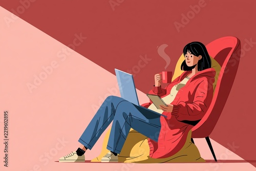 A young woman relaxing in a comfortable chair while working on her laptop with a warm beverage