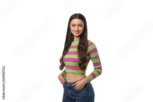 Young woman with long hair poses stylishly in bright attire, PNG