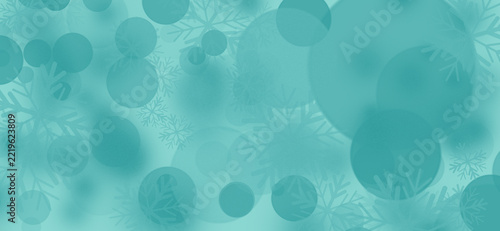 Abstract christmas background with teal bokeh circles and snowflake