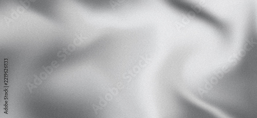 Silver glitter fabric background with soft waves and sparkling