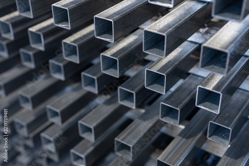 Stack of square steel tubes seen end on in sharp perspective