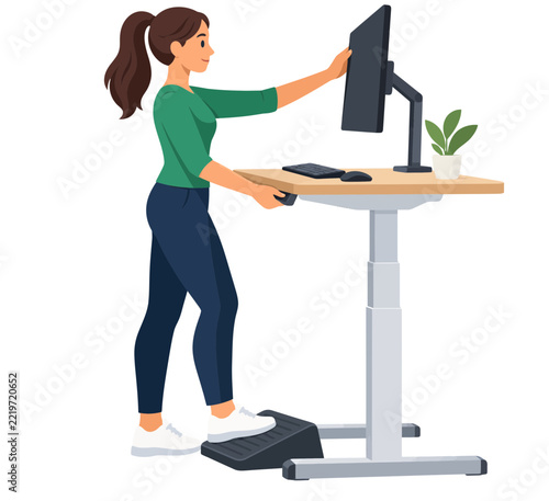 Employee Adjusting an Ergonomic Sit-Stand Workstation