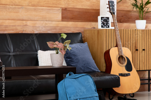 Work-life balance and creative lifestyle cozy living room interior with acous...