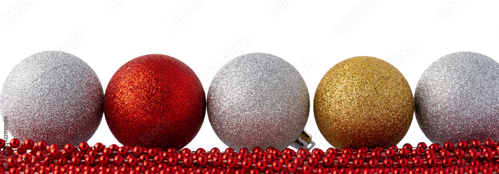 Fototapeta premium Colorful Christmas ornaments and beads on a white background ready for holiday decoration