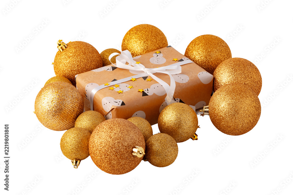 Fototapeta premium Golden Christmas ornaments and a wrapped gift on a white background