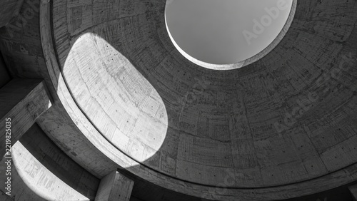 Modern Industrial Circular Concrete Structure with Light and Shadow Play