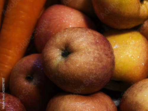 Close up food, fresh apple with water drops on the skin very freshness looking and to eat. vegan, color, diet, advert, publish, advt, art, arts, moisture, orange, yellow, focus, lighting, fine art
