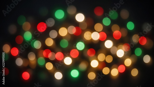 Colorful bokeh light background with glowing circular lights creating festive abstract atmosphere