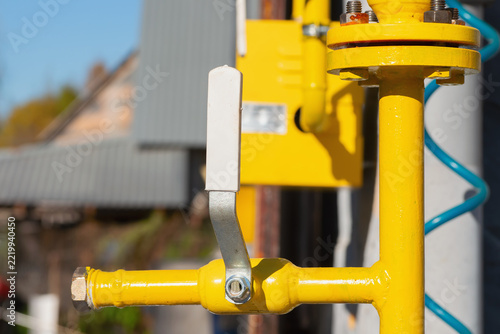 Pipe, flanges and valve on a gas pipeline to a residential building