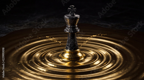 Black chess king standing in rippling gold liquid. Black Friday retail concept and seasonal promotion. Business strategy, leadership and competitive decision making.