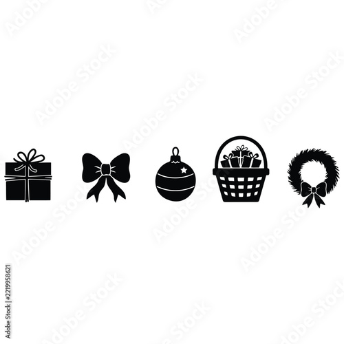 Winter holiday silhouette icons featuring gift basket bow and christmas ball on white set.