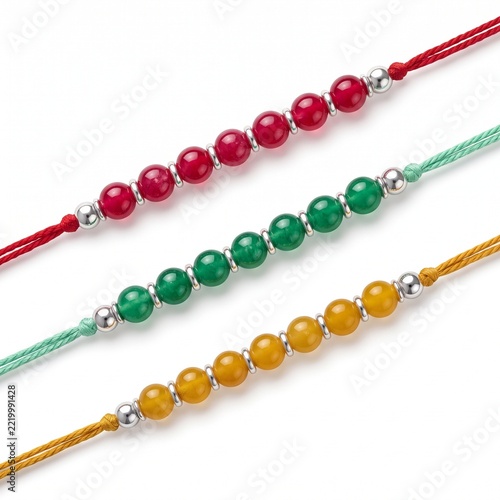 Three Handcrafted Raksha Bandhan Rakhi Bracelets Arranged in Parallel Composition.