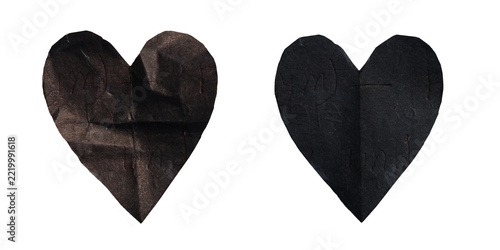 Two black paper hearts isolated on transparent background for
