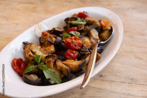 Roasted eggplant caponata in ceramic dish