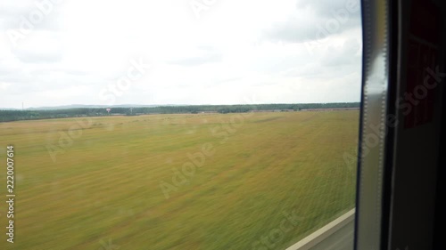 Window of high‑speed train traveling at high speed