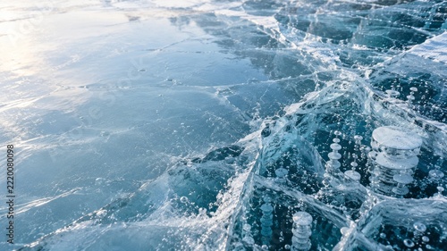 Trapped Air Bubbles and Fine Fractures in Clear Blue Frozen Lake Ice