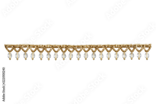 Fotografie Elegant golden beaded trim with clear teardrop crystals, arranged in a decorativ