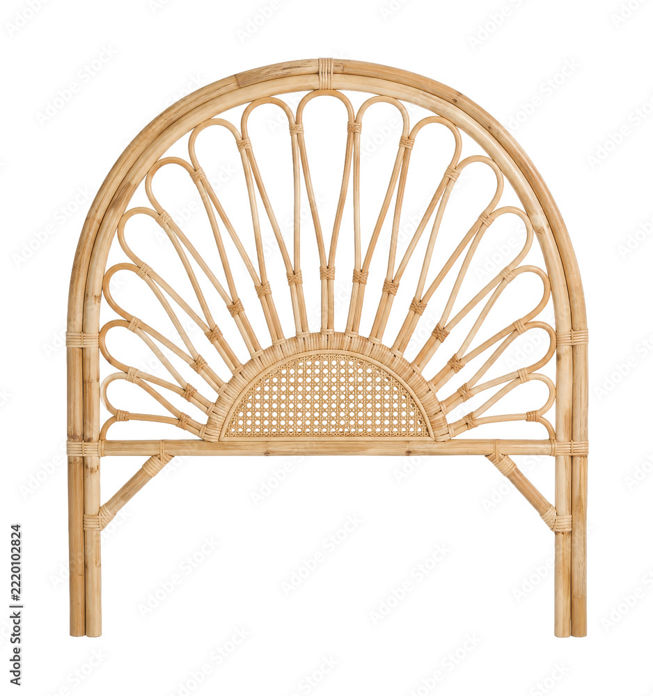 Naklejka premium Beautiful natural rattan arched headboard with intricate woven details, featuring a cane webbing panel, isolated on a clean white background