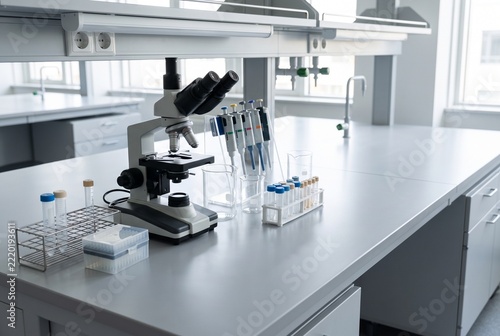 Modern science laboratory with microscope and glassware