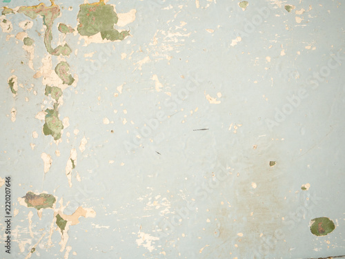 Peeling Light Blue Green Paint on Concrete Wall with Flaking Patches for Vintage Cafe and Retro Store Design