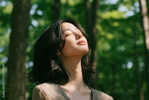 Square Close Up of Korean Woman Closing Eyes in Peaceful Mindful Meditation in Summer Forest