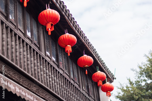 Red lanterns hanging outside historic building for festive