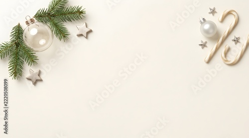 Christmas fir branches and candy canes frame on white background