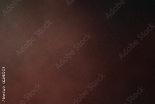 Dark grainy abstract background with teal orange gradient, faded black vignette, high contrast matte surface texture, film noise and open copy space