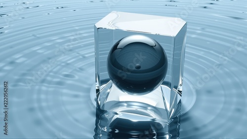 Sphere rests atop cube, both submerged. Ripples radiate outward from disturbance in water. Minimalist composition, cool tones dominate scene.