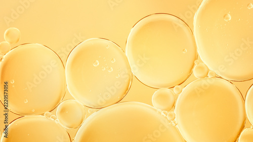 Luxury gold oil bubbles macro texture background with copy space
